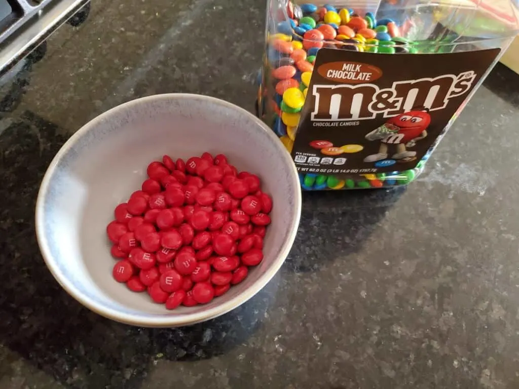 Bowl with all red m and ms.