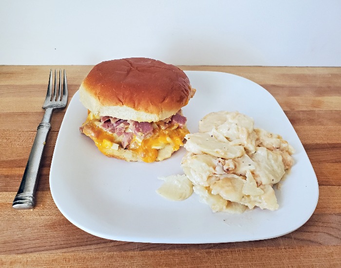 Plated hot ham salad sandwich