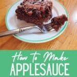 Slice of chocolate cake with a fork holding a bite and text how to make applesauce snack cake.