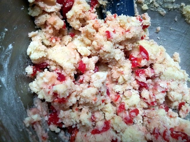 Dough for cherry cookies is thick and crumbly