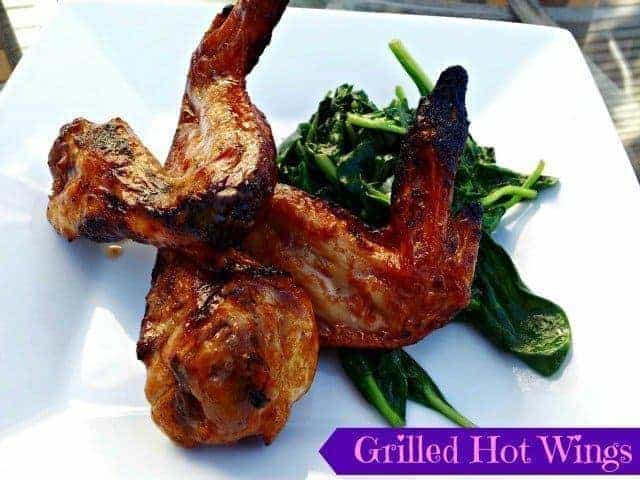 Grilled hot wings with sauteed spinach