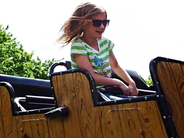 Little Miss loves the roller coaster too