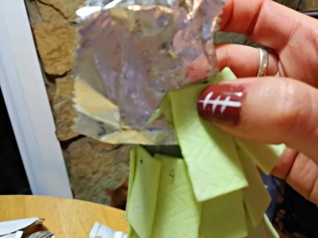 Attaching the gum top using wrappers as wrapping paper