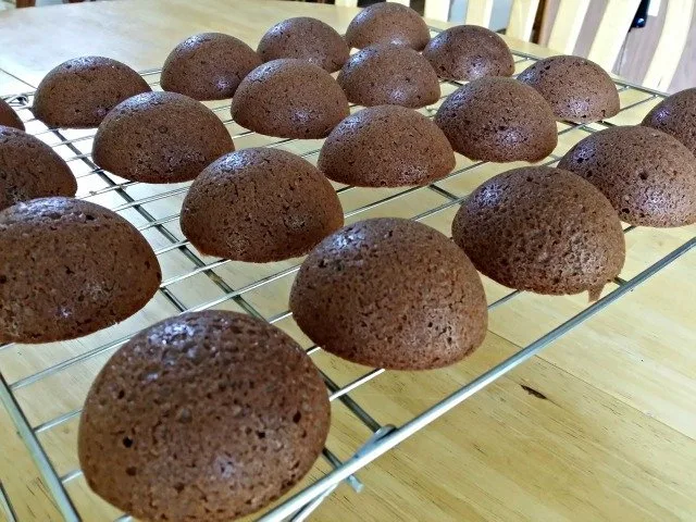 Brownie cupcakes cooling on the rack