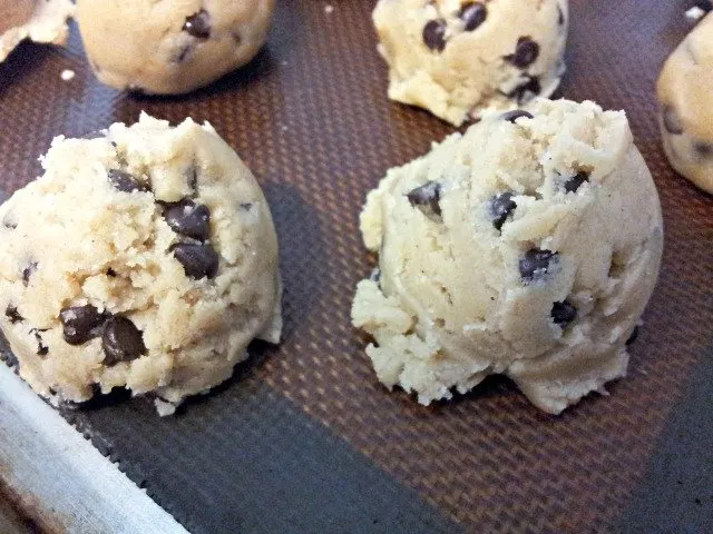 Cookie dough truffles on the sheet before rolling