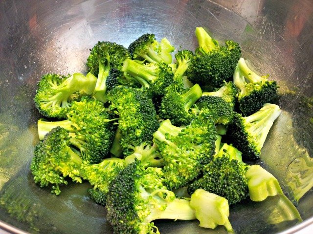 Toss broccoli with marinade to coat evenly