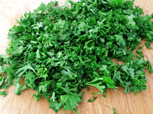 Chopped herbs for French potato salad recipe