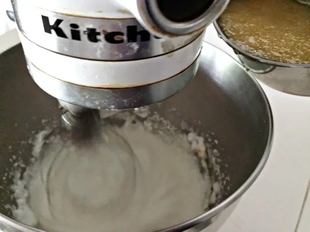 Add sugar mixture to egg whites