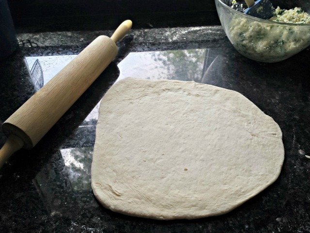 Roll out your dough for calzones to 10 inch circles