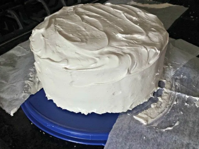 Remove parchment paper strips once your cake is decorated for a clean cake plate