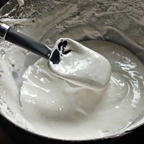 Finished frosting will resemble marshmallow fluff, though not as thick