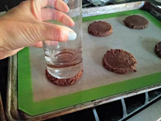 Flatten cookies for ice cream sandwiches with a glass