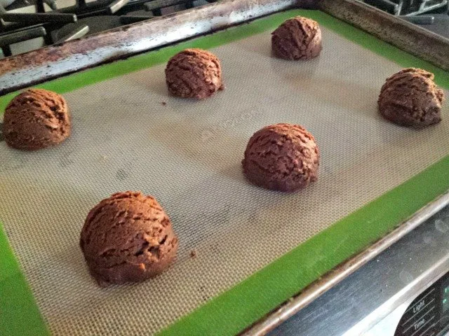 Cookie dough balls on the sheet