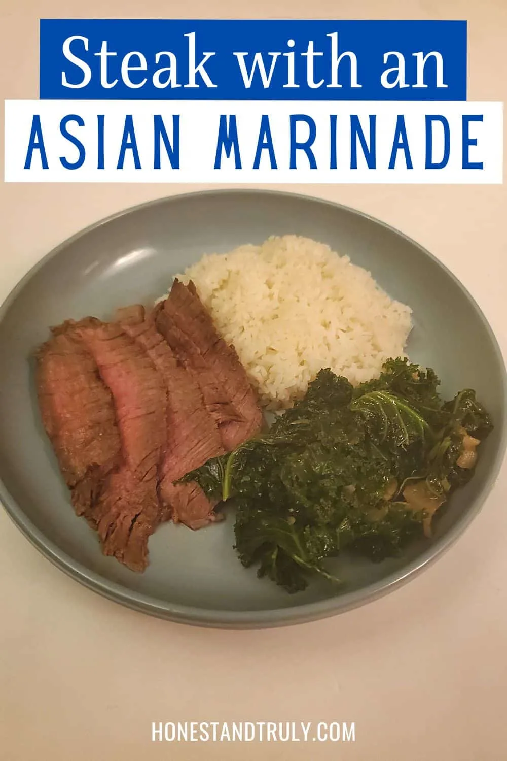 Overheard of plate with sliced Asian marinated steak, greens, and rice with text steak with an Asian marinade.