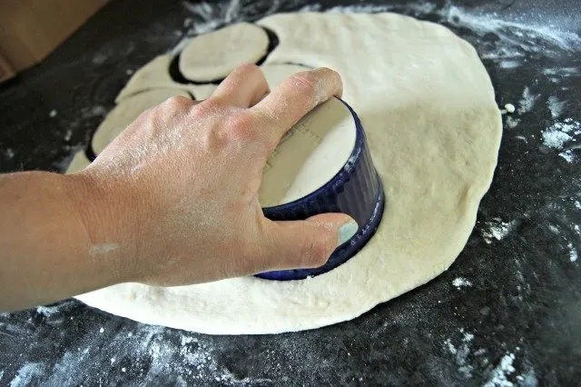 Use a ramekin to cut circles of biscuit dough