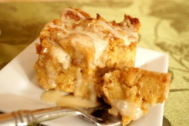 Cinnamon roll bread pudding on a fork