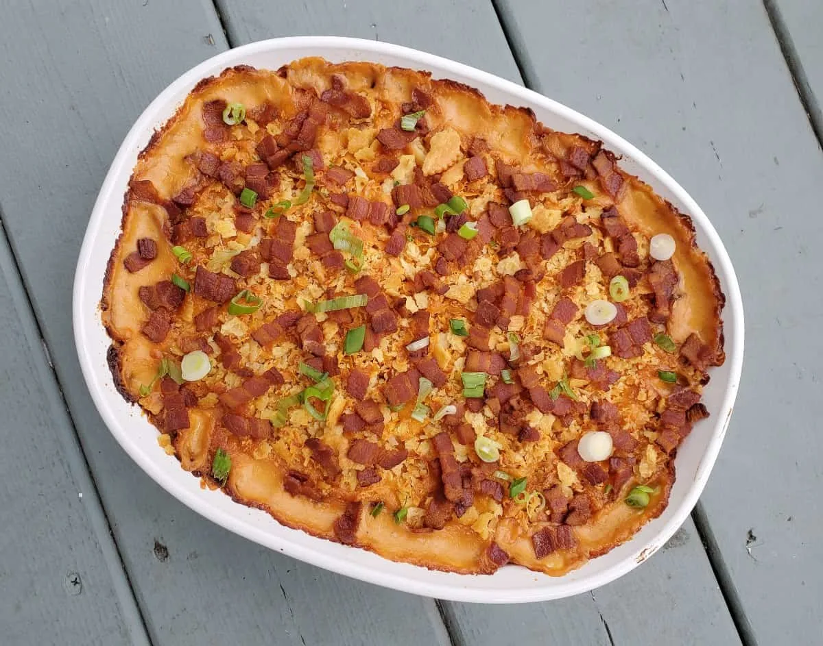 Overhead image of corn casserole in a white dish.