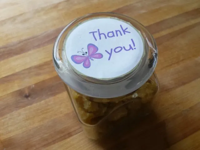 Round thank you gift tags on a mason jar gift