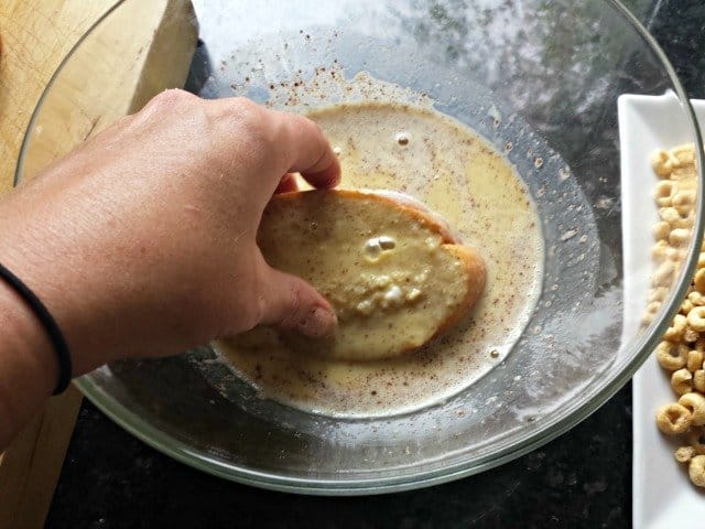 Dip bread into custard mix