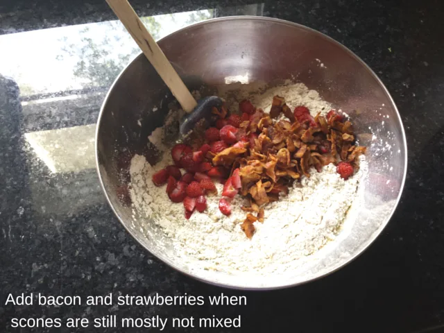 Adding bacon and strawberries to scone dough