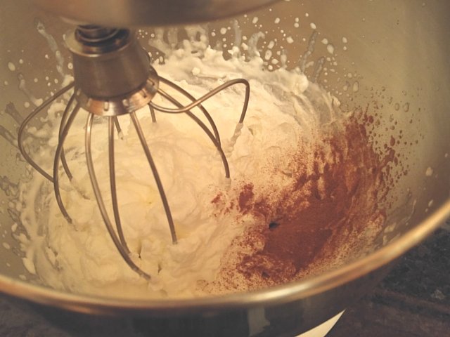 Add cinnamon to whipped cream once it is whipped