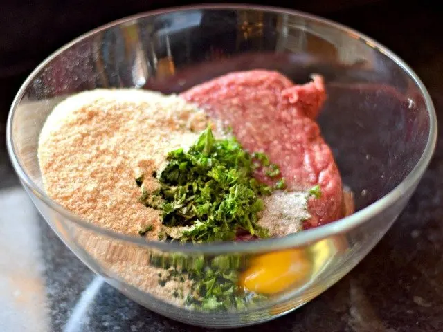 Add ingredients to make meatballs