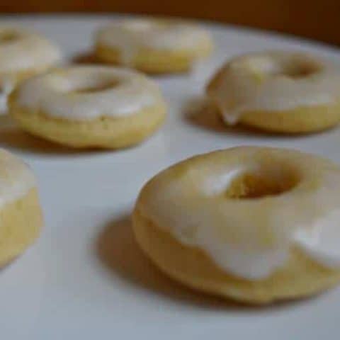 Enjoy a plate of lemon glazed donuts