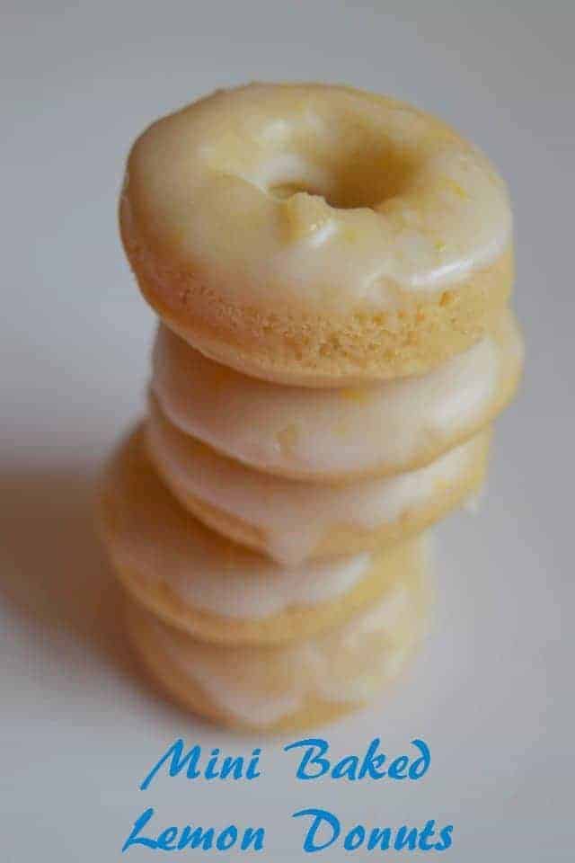 Mini Baked Lemon Donut Recipe. Make these fun and easy donuts with a lemon glaze for a fun breakfast treat or create mini doughnuts for a pot luck. These lemony from scratch donuts are ready in a half hour.