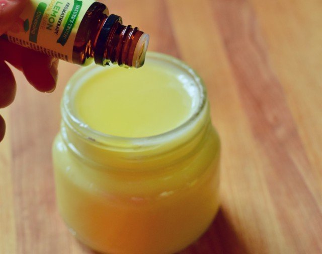 Add drops of lemon essential oil to homemade deodorant cream