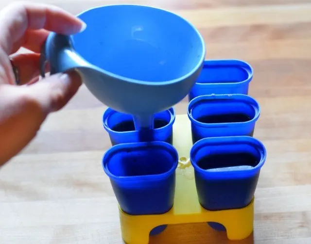 Use a funnel to pour coffee into ice cube trays or popsicle molds
