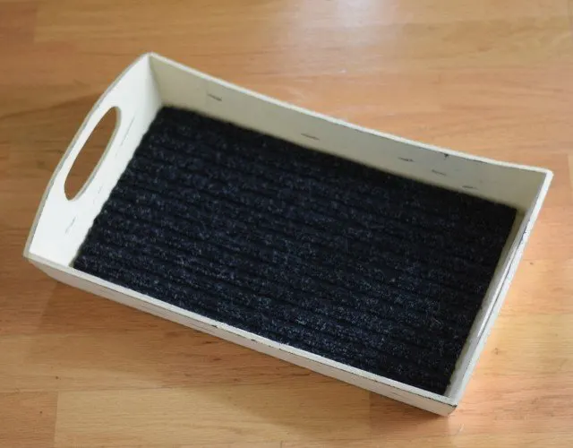 Fit rug to tray to create DIY football tray