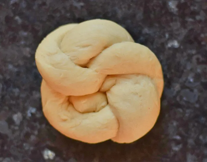Perfectly formed homemade dinner roll knots