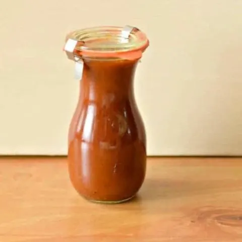 Jar of homemade bbq sauce vinaigrette salad dressing