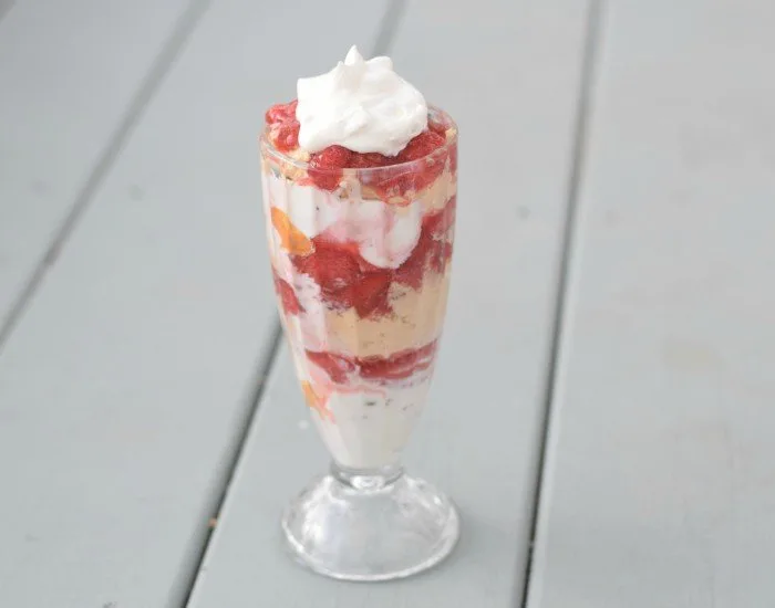 Top PBnJ Parfait with homemade whipped cream