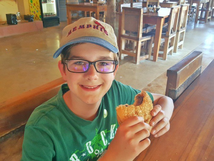 Enjoy an ostrich burger at the end of your ostrich farm tour Curacao