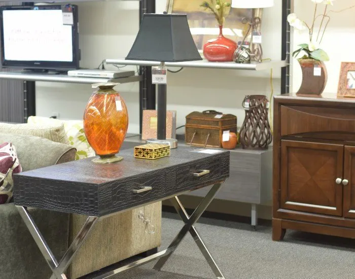 Use nontraditional pieces of basement furniture to create storage options