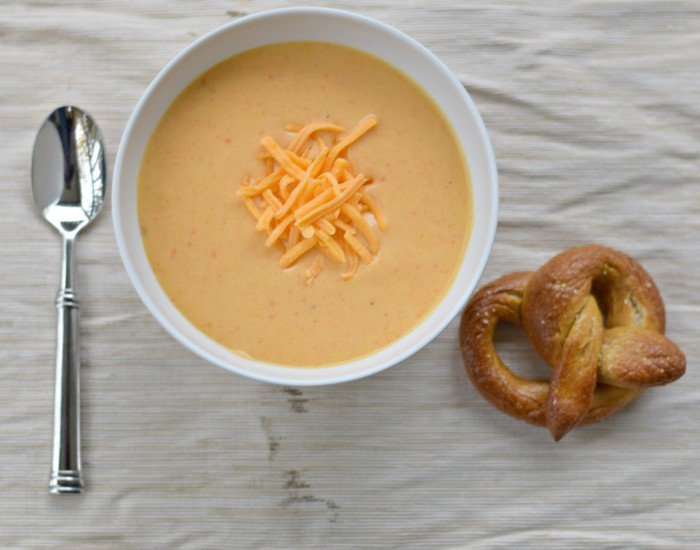 Enjoy Instant Pot beer cheese soup with homemade soft pretzels