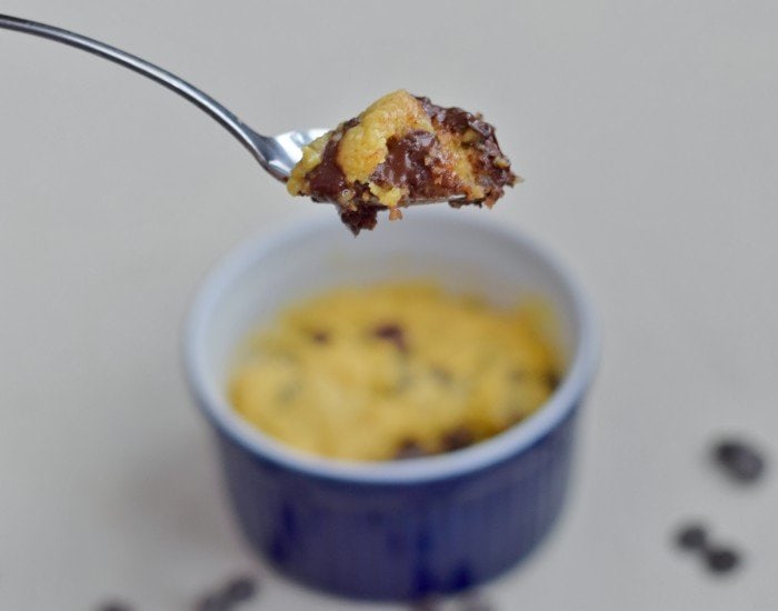 Bite of individual microwave chocolate chip cookie