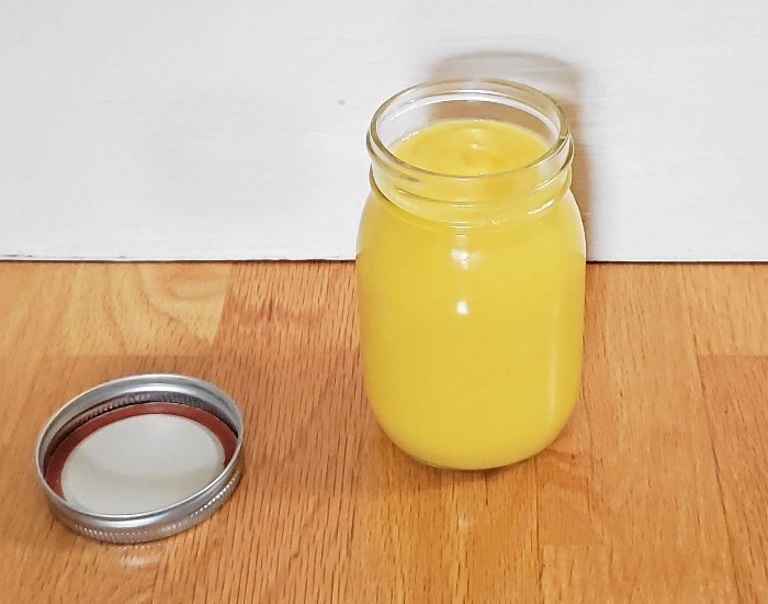 Jar of mango curd