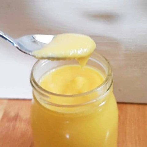 Spoon of mango curd