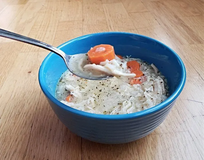 Spoon of chicken and rice soup