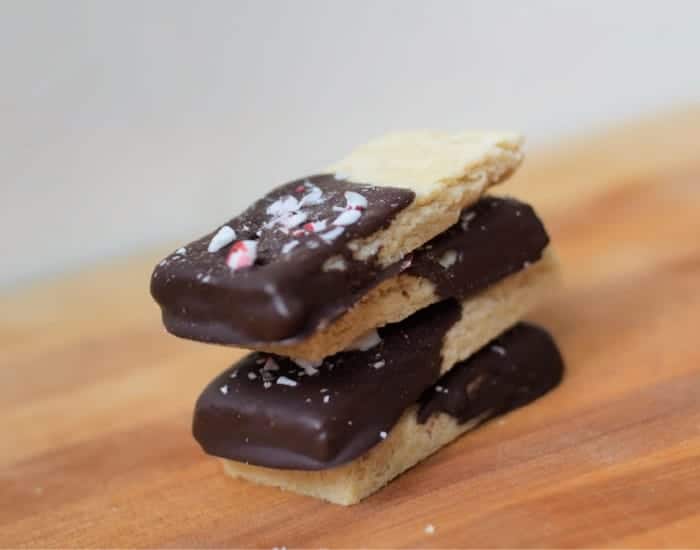 Stack of chocolate dipped shortbread cookies