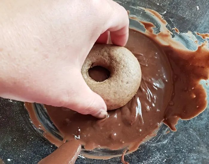 Dip and twist mocha donuts in glaze