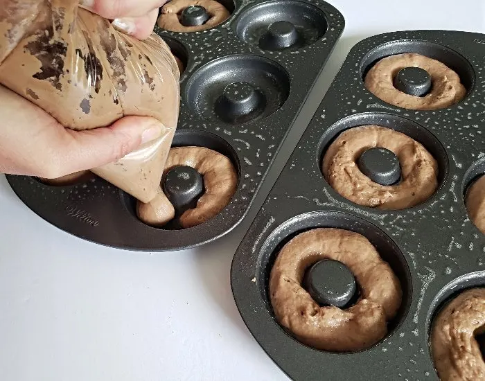 Pipe into donut pans