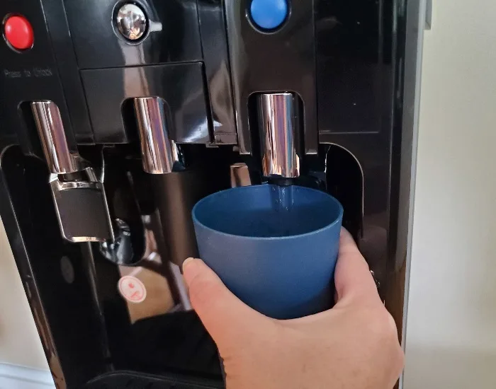 Filling cup with Primo water