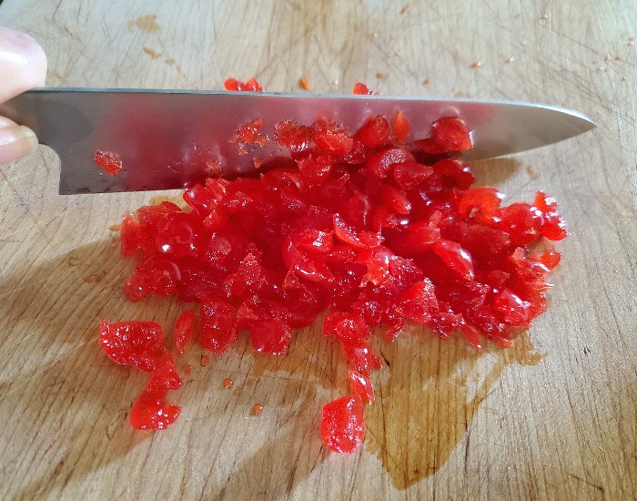 Chop maraschino cherries