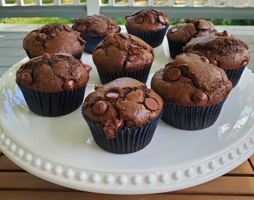 Double chocolate muffins on a cake stand