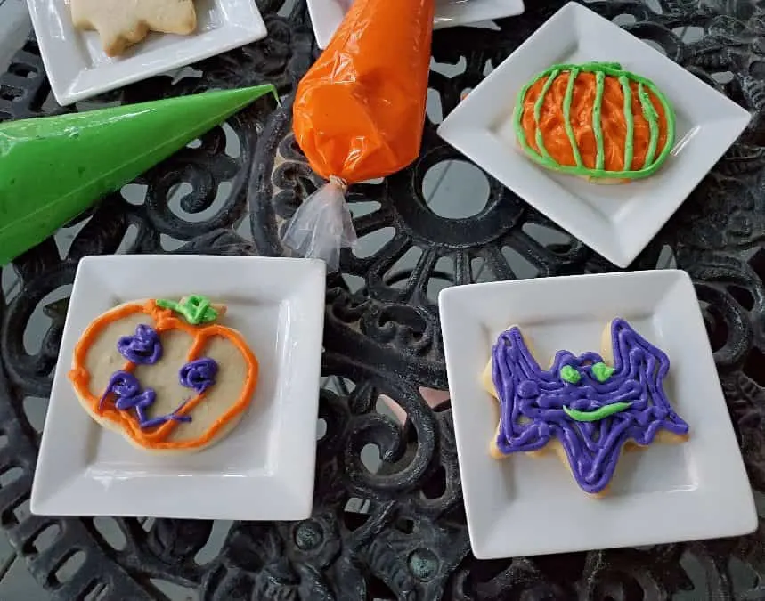 Various Halloween cookies decorated with icing