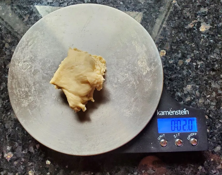 Weighing dough for rolls