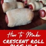 Test of how to make crescent roll pigs in a blanket with image of bagel dogs on a silpat above.